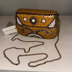 Antik Kraft metal clutch